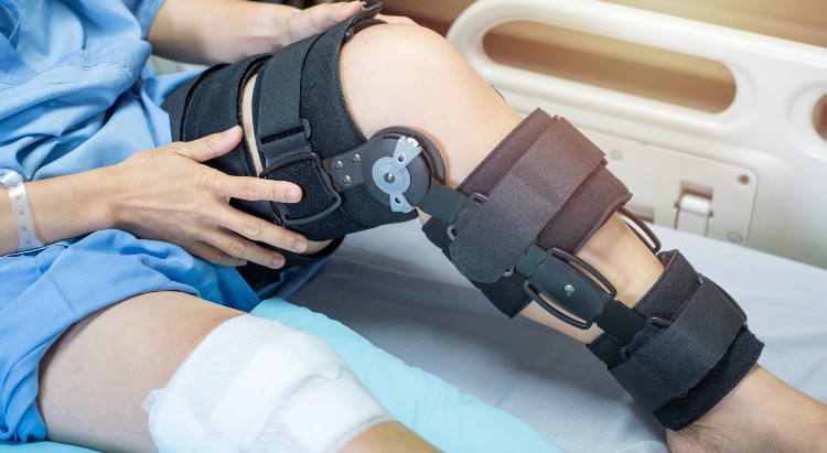 operative treatments cartilage repair near syracuse ny image of person in knee brace