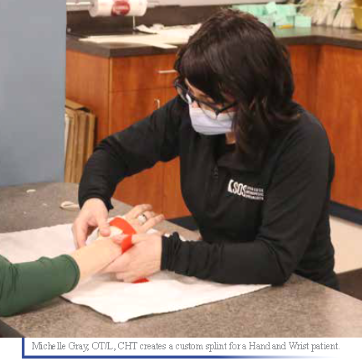 Michelle Gray, ODL creates a custom splint for a hand therapy patient at SOS