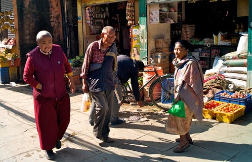 nepal people walking in street syracuse orthopedic specialists