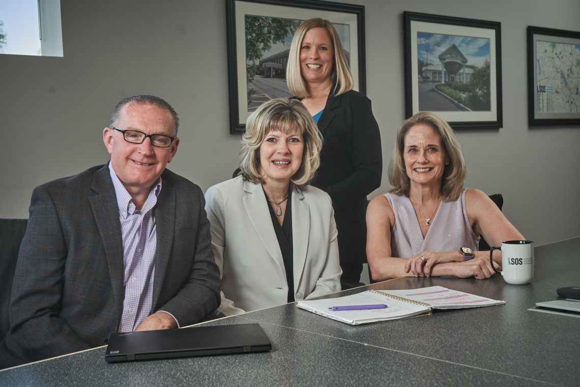 Mike Humphrey, CEO, Pamela Hilliar, Director of Customer Service and Patient Access, Jessica Woodruff (standing), CFO, Kim Murray, CCO