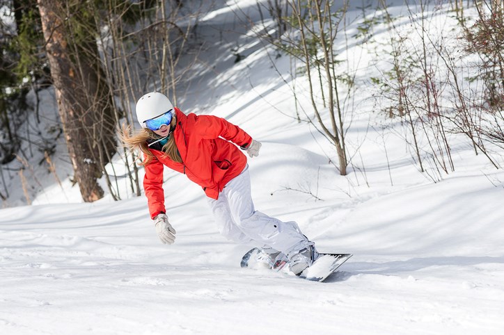 enjoying winter sports safely orthopedic specialists near syracuse ny girl snowboarding