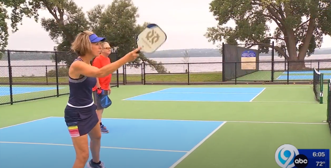 Two people playing pickleball at onondaga lake park in Syracuse NY