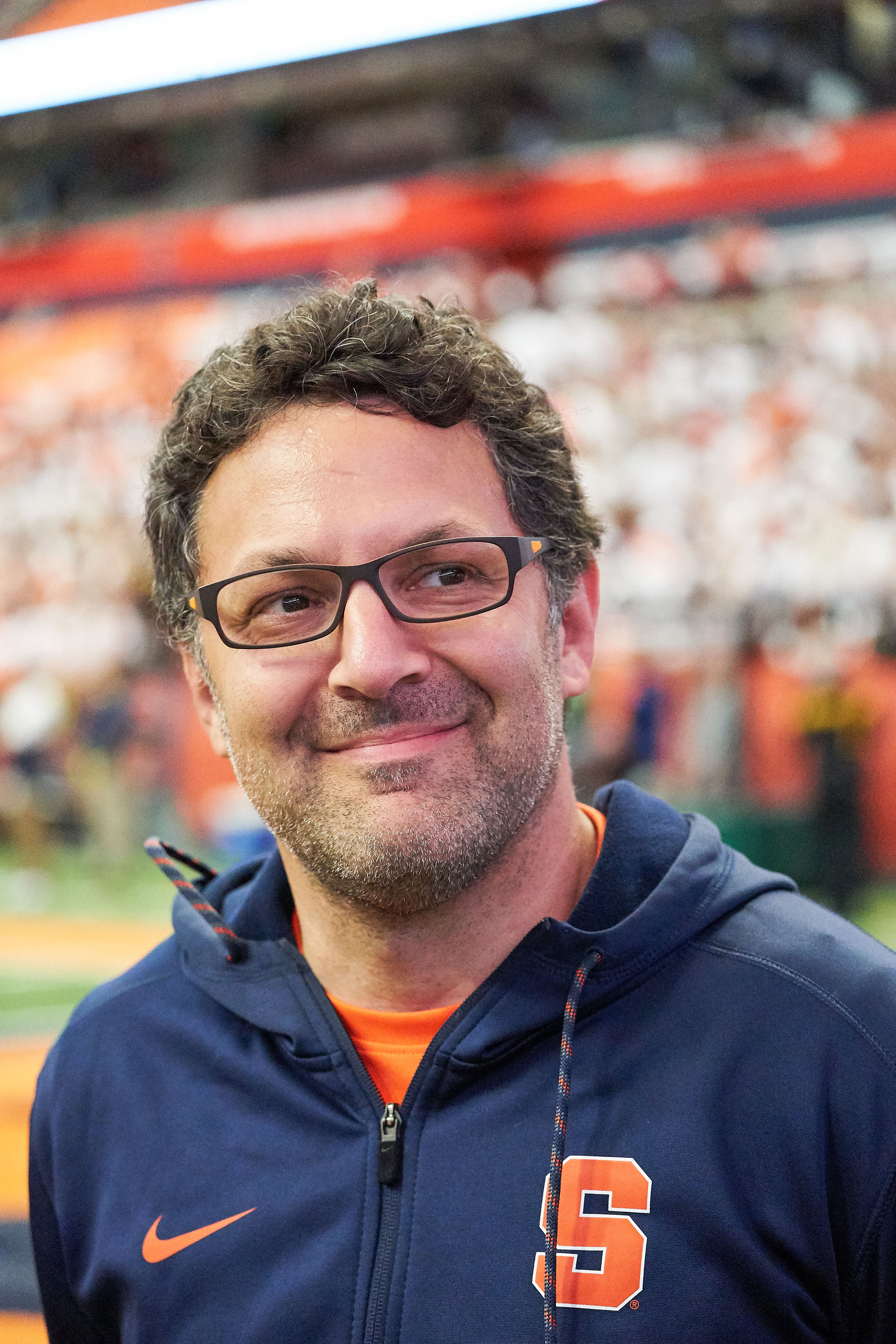 Todd Battaglia SU Team Orthopedist on the field at the Dome during SU Football