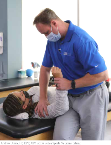 Andrew Green, PT at SOS works with shoulder sports medicine patient