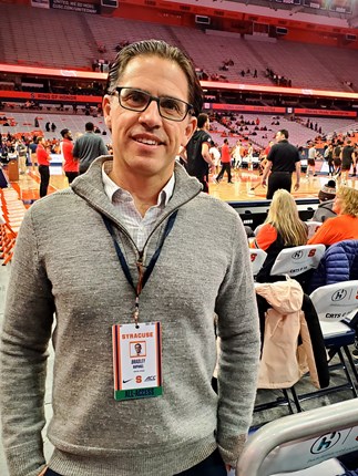 Dr. Brad Raphael at an SU Basketball Game