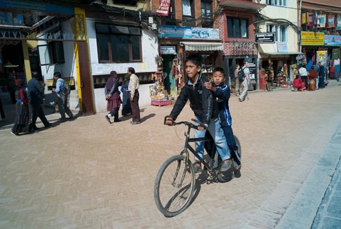 nepal children biking sos
