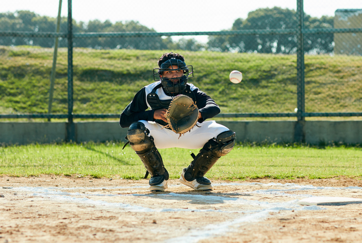 Baseball player in a crouched postion