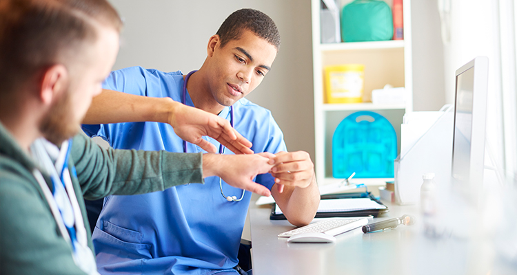 dupuytrens contracture near utica ny image of doctor touching patient hand for diagnosis
